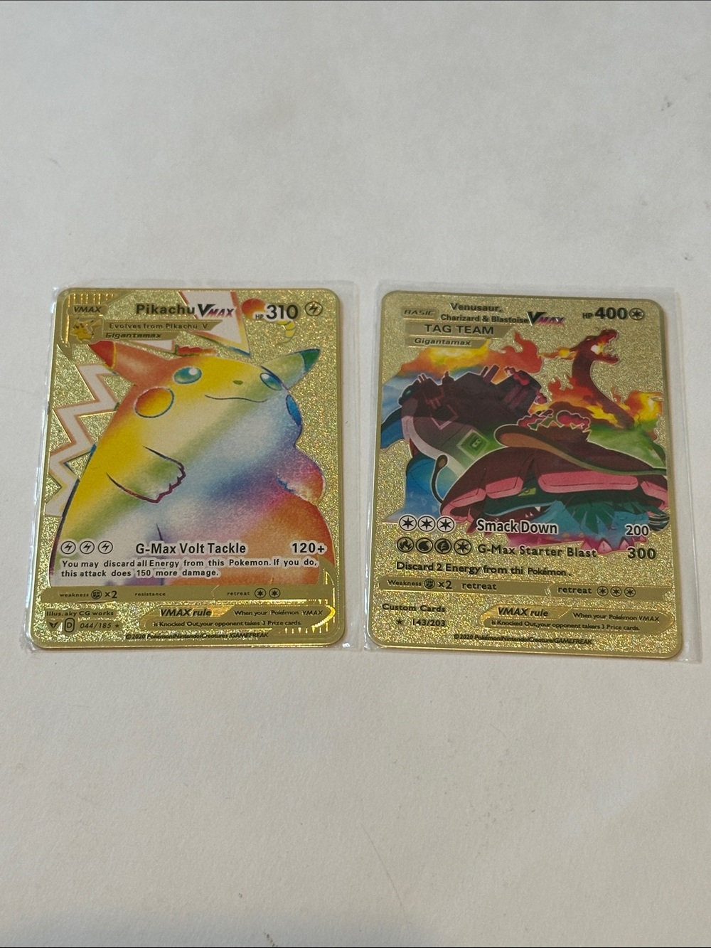 Pikachu VMAX + Tag Team Venusaur, Charizard, & Blastoise Pokémon Gold Metal Card